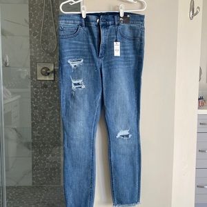 Express size 12 regular dark blue jeans. Distressed. Never worn